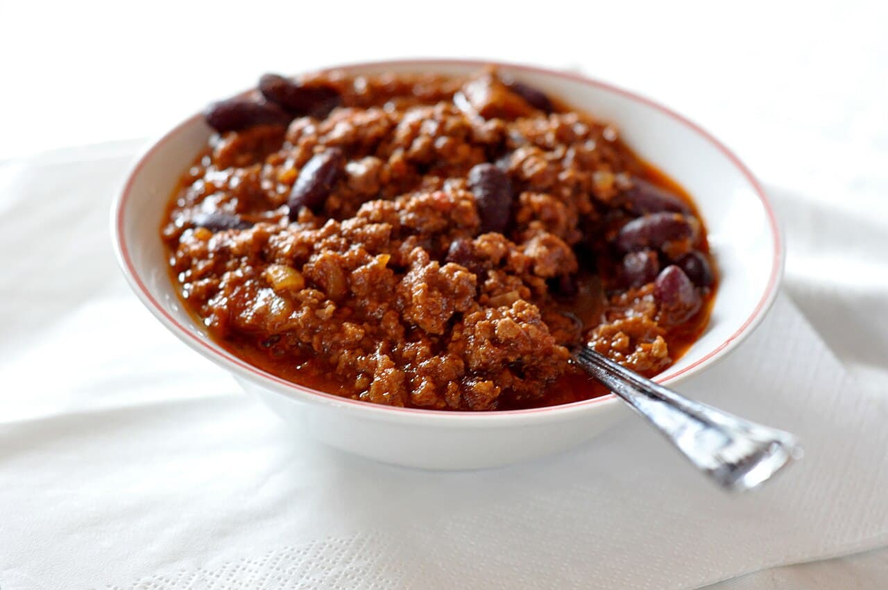 Bowl of beef chilli con carne with beans